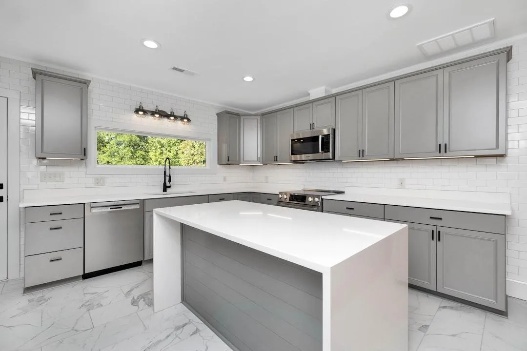 Modern kitchen with freshly painted gray cabinets